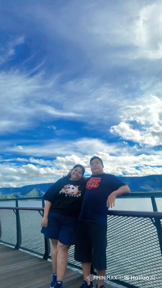 Couple's Playful Moment on Lakefront Deck – AI Generated Video | Hailuo AI