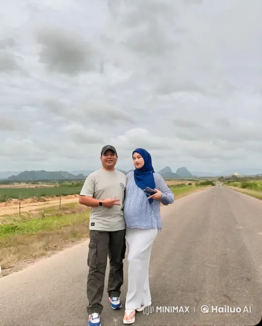 Man Demonstrates Kung Fu on Country Road with Woman Watching – AI Generated Video | Hailuo AI