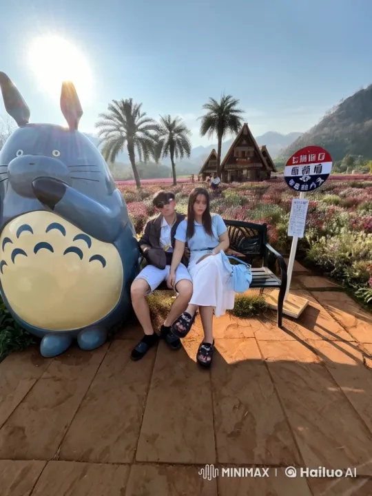 Couple Showcases Martial Arts Amidst Serene Garden and Totoro Statue – AI Generated Video | Hailuo AI