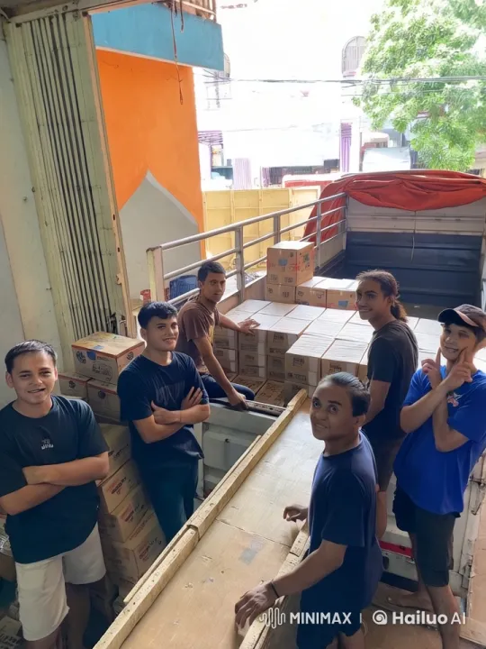 Young Men Unload Truck with Camaraderie and Purpose – AI Generated Video | Hailuo AI