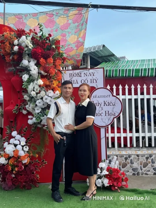 Couple Performs Kungfu in Front of Floral Display – AI Generated Video | Hailuo AI