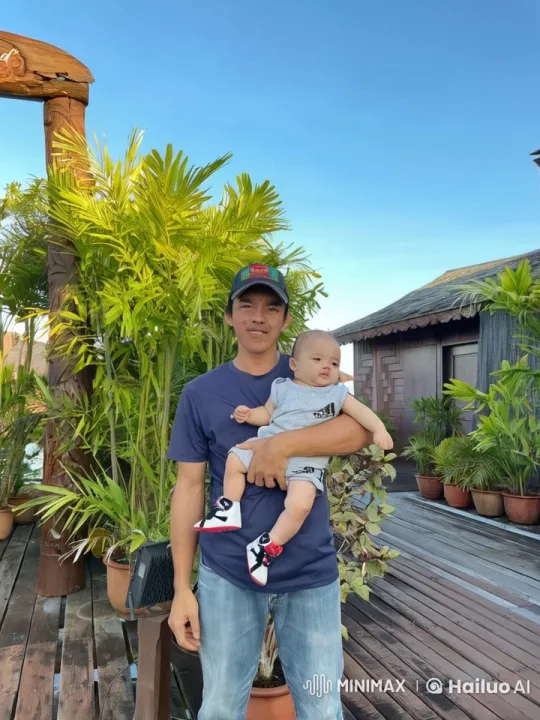 Man Demonstrates Kung Fu with Child in Serene Garden Setting – AI Generated Video | Hailuo AI