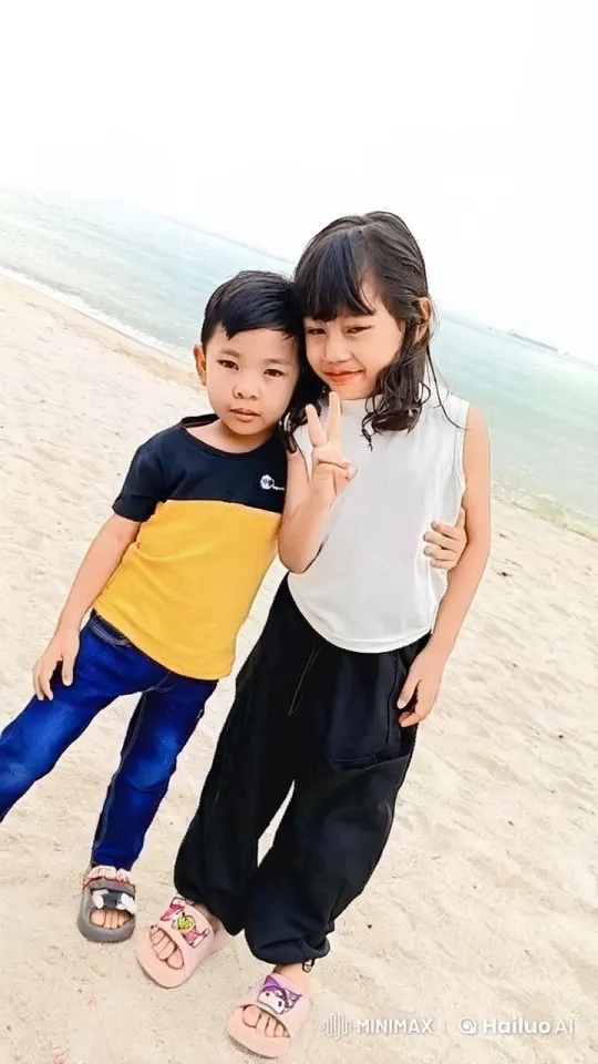 Children's Playful Kung Fu Fight on Sandy Beach – AI Generated Video | Hailuo AI