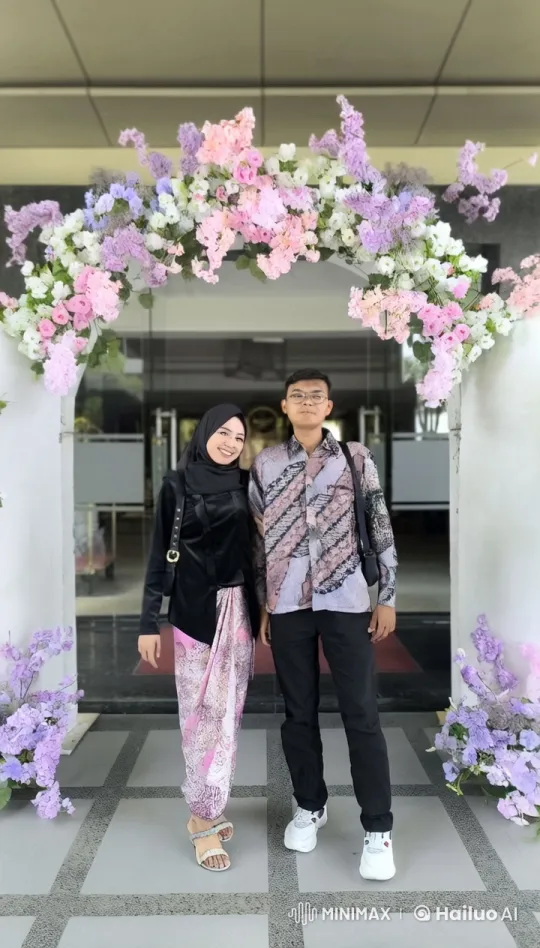 Traditional Attire Kungfu Fight Under Floral Arch – AI Generated Video | Hailuo AI