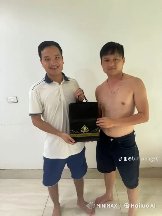 Two Men Sharing a Moment with Gift Bags – AI Generated Video | Hailuo AI