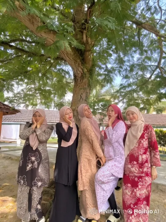 Traditional Attired Women Perform Kungfu Under Tree – AI Generated Video | Hailuo AI