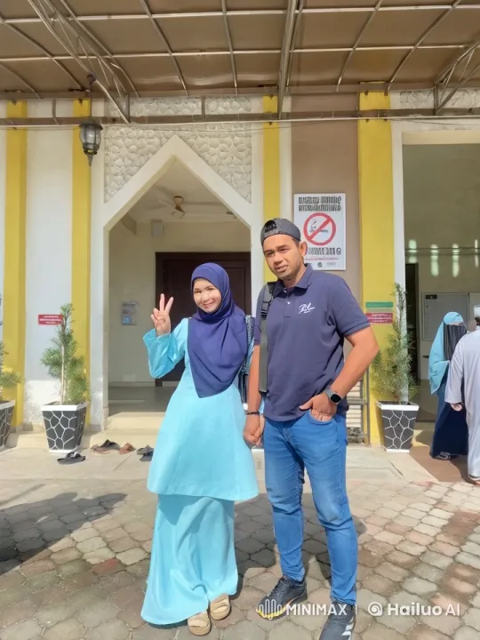 Couple Practicing Playful Kung-Fu in Front of Building – AI Generated Video | Hailuo AI
