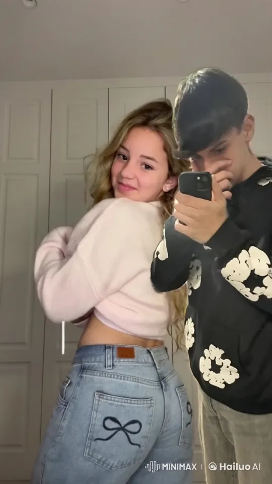 Affectionate Moment Between Young Couple in Cozy Room – AI Generated Video | Hailuo AI