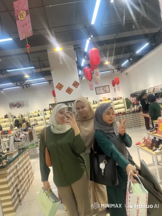Hijab-Wearing Women Perform Kung Fu in Festive Shoe Store – AI Generated Video | Hailuo AI