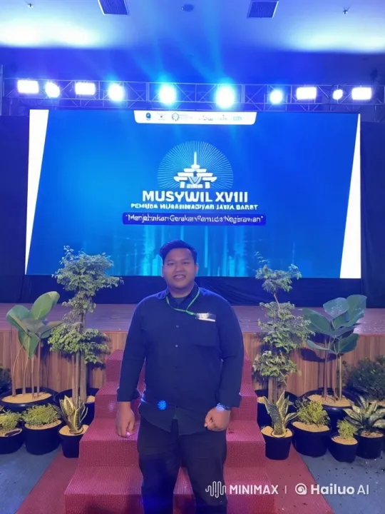 Formal Event: Man on Stage with Potted Plants and Blue Screen Background – AI Generated Video | Hailuo AI