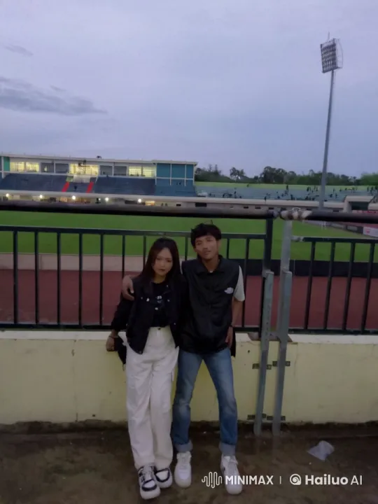 Couple Performs Dynamic Kungfu at Evening Stadium – AI Generated Video | Hailuo AI