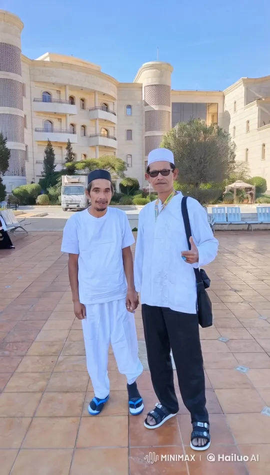 Traditional Attire Men Stand by Grand Building – AI Generated Video | Hailuo AI
