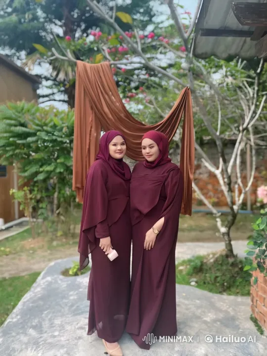 Maroon Outfits: Synchronized Kungfu Fight in Garden Setting – AI Generated Video | Hailuo AI
