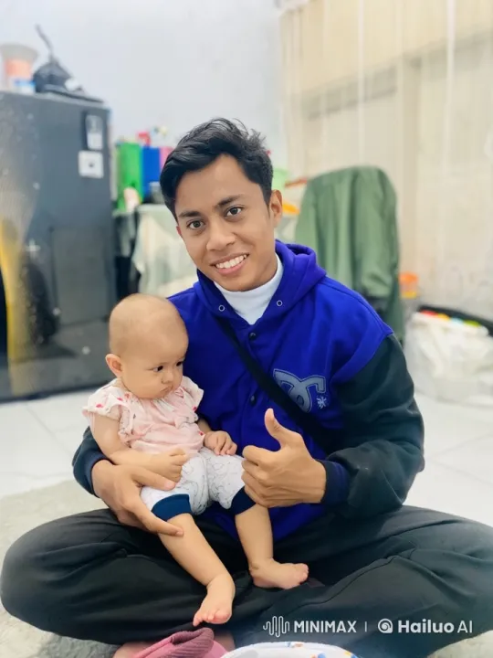Young Man and Baby Pose for Video – AI Generated Video | Hailuo AI
