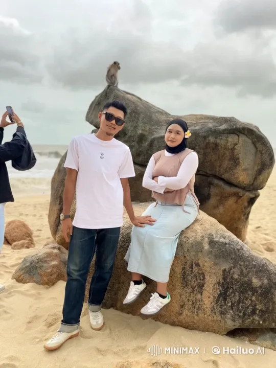 Kung Fu Masters Fight Gracefully on Beach with Curious Monkey – AI Generated Video | Hailuo AI