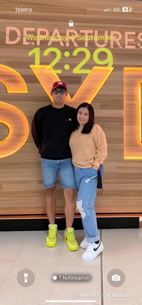 Casual Attired Couple Performs Kung Fu at Airport Departures – AI Generated Video | Hailuo AI