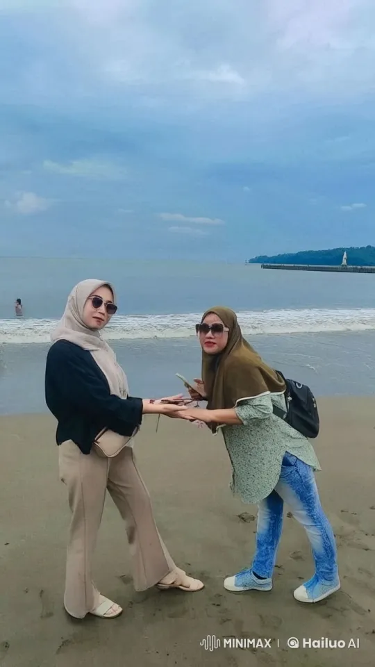 Two Women Practicing Playful Kung Fu on a Beach – AI Generated Video | Hailuo AI