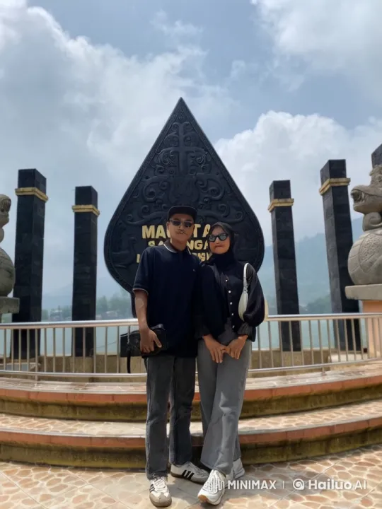 Couple Demonstrates Martial Arts in Scenic Monument Setting – AI Generated Video | Hailuo AI