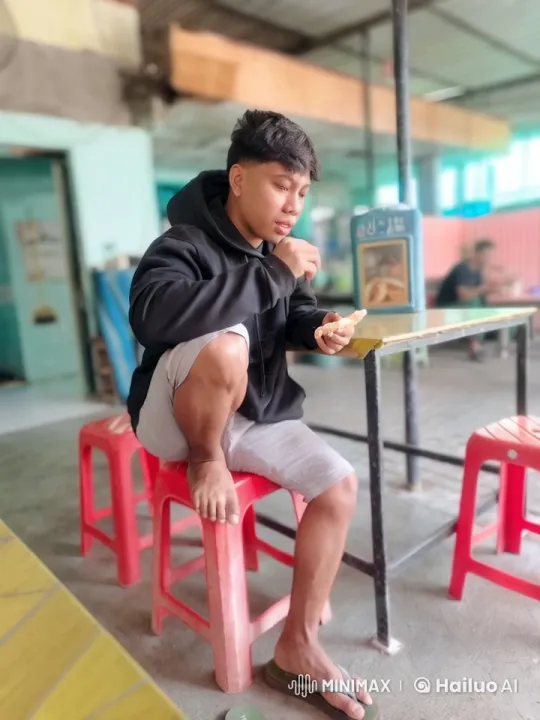 Young Man Practicing Kung Fu in Eatery – AI Generated Video | Hailuo AI