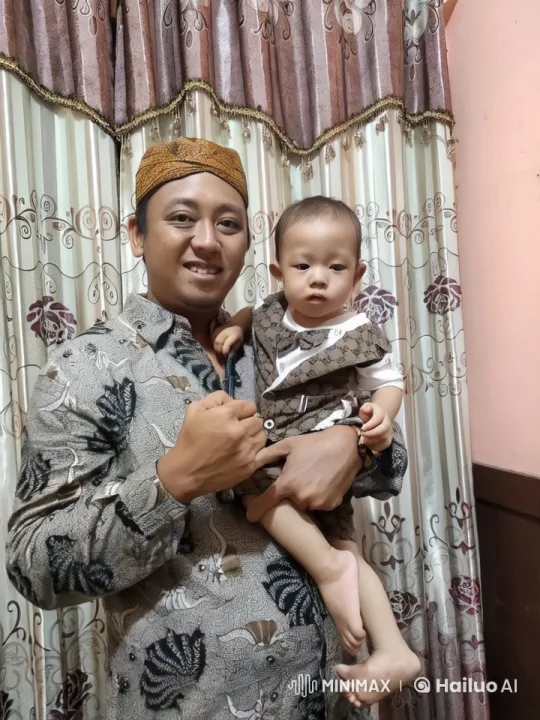 Kung Fu Master Demonstrates Skill with Baby in Matching Outfit – AI Generated Video | Hailuo AI