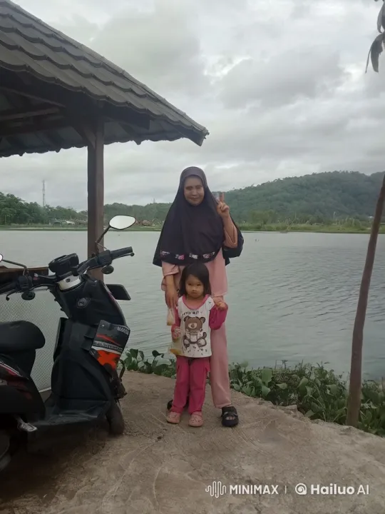 Woman and Child Practice Kungfu by Serene Lake – AI Generated Video | Hailuo AI