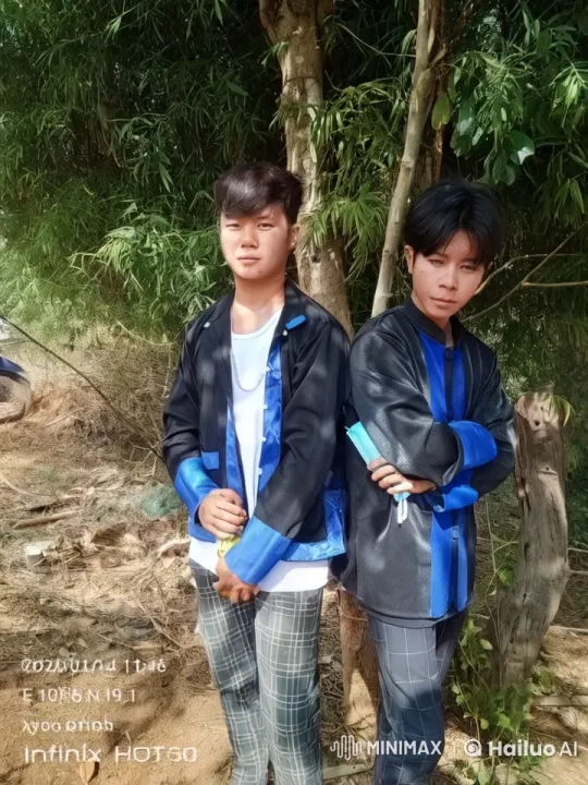 Young Men in Traditional Attire Engage in Playful Movement – AI Generated Video | Hailuo AI