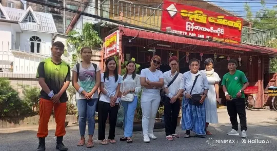 Nine friends perform playful kungfu in front of a restaurant. – AI Generated Video | Hailuo AI