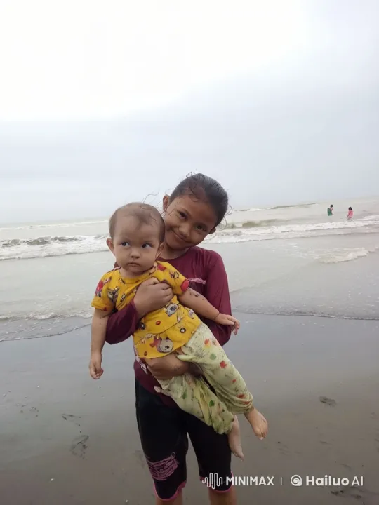 Child Practices Kung Fu on Beach, Baby Watches – AI Generated Video | Hailuo AI