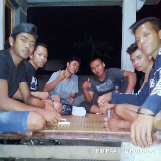 Friends Relaxing on a Wooden Platform at Night – AI Generated Video | Hailuo AI