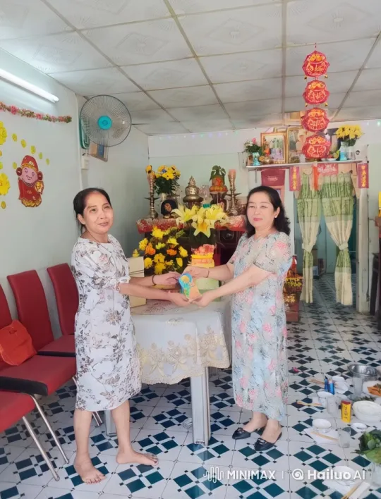 Two Women Exchange Gift in Festive Decorated Room – AI Generated Video | Hailuo AI