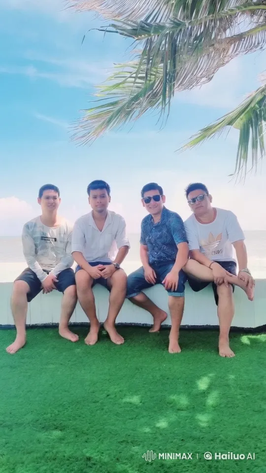 Four Men Relax on a Seaside Bench – AI Generated Video | Hailuo AI
