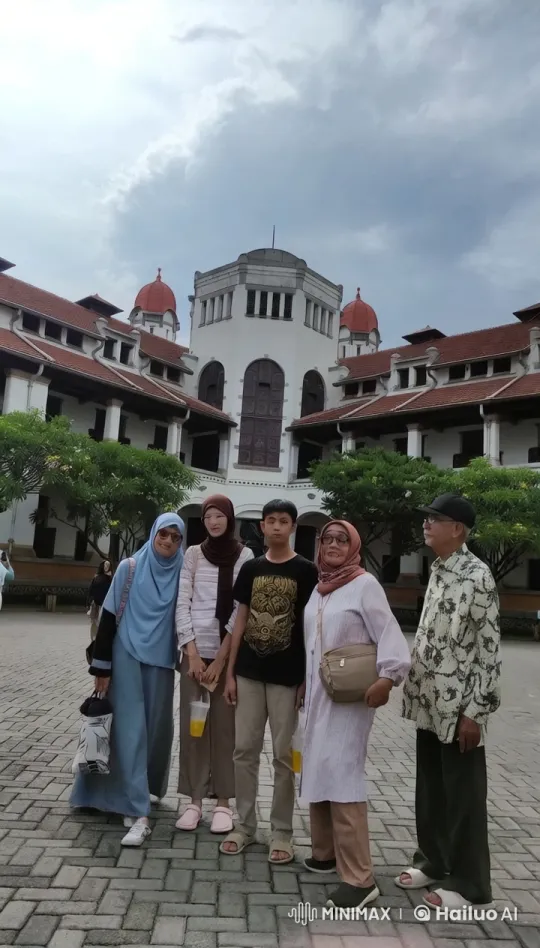 Group Photo in Front of Historic Building with Red Domes – AI Generated Video | Hailuo AI