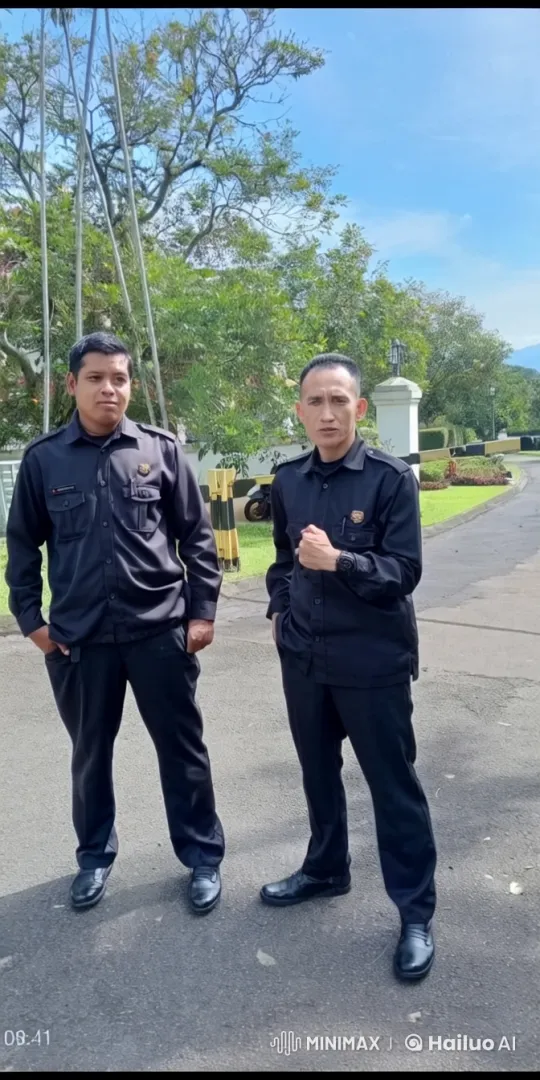 Two Security Guards Standing in a Lush, Sunny Setting – AI Generated Video | Hailuo AI