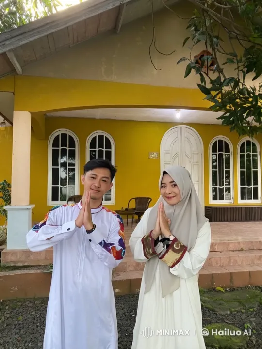 Traditional Attire Kungfu Display in Front of Yellow House – AI Generated Video | Hailuo AI