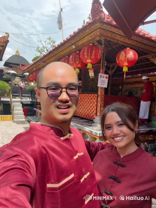 Red Attired Pair Perform Kungfu in Front of Chinese Temple – AI Generated Video | Hailuo AI