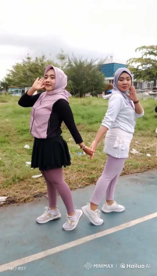 Young Women Engage in Playful Mock Fight – AI Generated Video | Hailuo AI