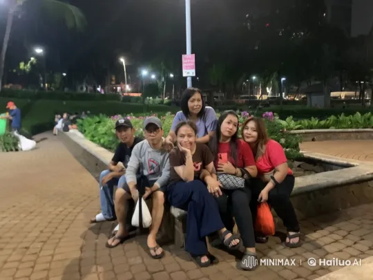 Friends Enjoy Evening as One Demonstrates Wing Chun in Park – AI Generated Video | Hailuo AI