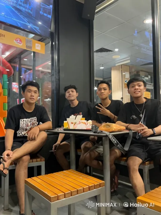 Young Men Enjoying Fast Food Engage in Playful Kung Fu – AI Generated Video | Hailuo AI