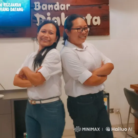 Two Women in Casual Stance with Welcoming Background – AI Generated Video | Hailuo AI