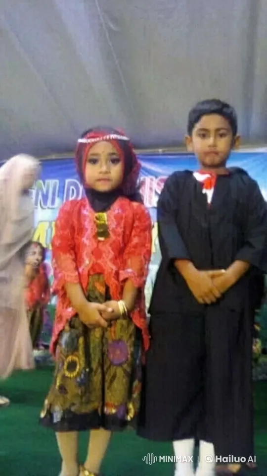 Children in Traditional Attire on Stage – AI Generated Video | Hailuo AI