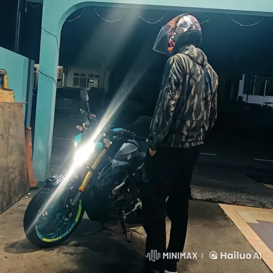 Motorcyclist Prepares Under Nighttime Shelter – AI Generated Video | Hailuo AI