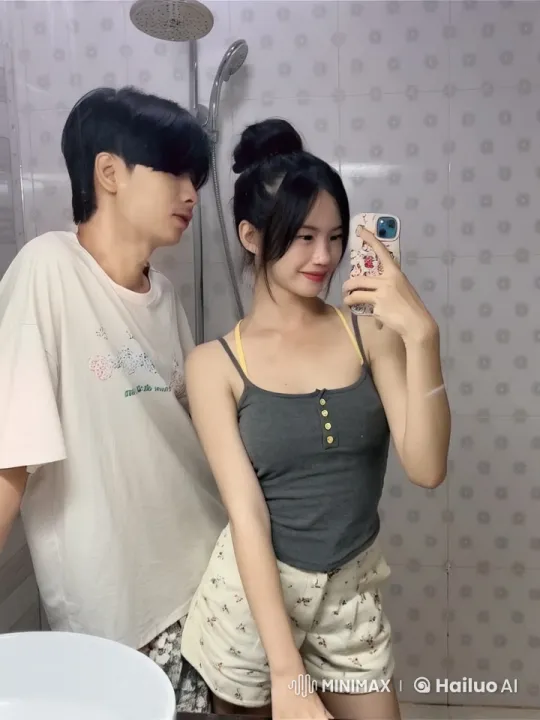 Couples' Playful Kung Fu Selfie in Bathroom – AI Generated Video | Hailuo AI
