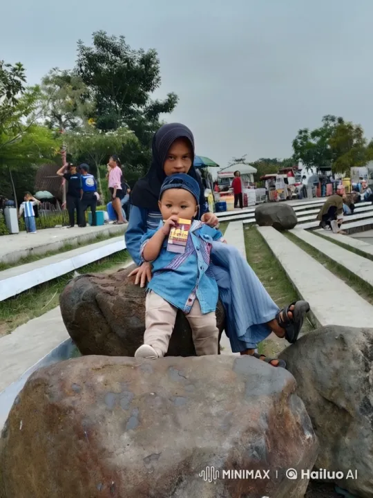 Japanese Family Enjoying Outdoors on Rock – AI Generated Video | Hailuo AI