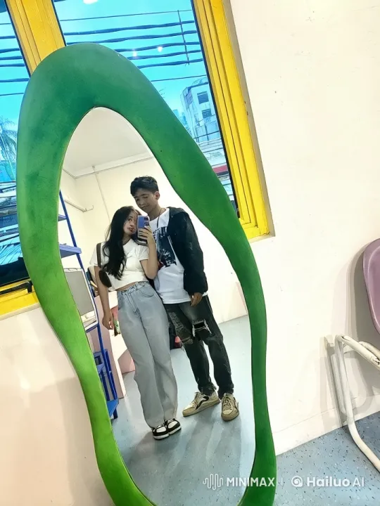 Young Couple Takes Mirror Selfie, Boy Shows Off Kung Fu Skills – AI Generated Video | Hailuo AI