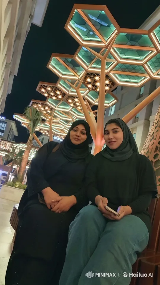 Evening Bench Chat in Futuristic Urban Setting – AI Generated Video | Hailuo AI