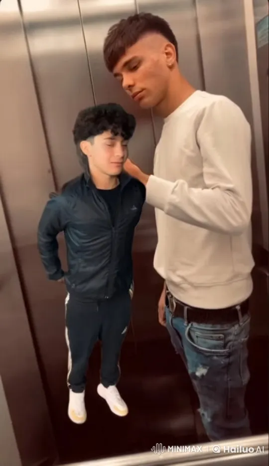 Young Men Share Intimate Moment in Stationary Elevator – AI Generated Video | Hailuo AI