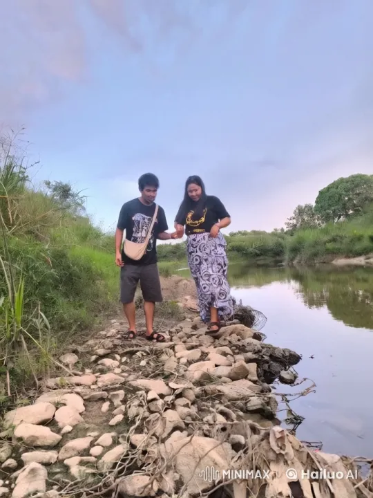 Peaceful Riverbank Interaction Amidst Nature's Beauty – AI Generated Video | Hailuo AI