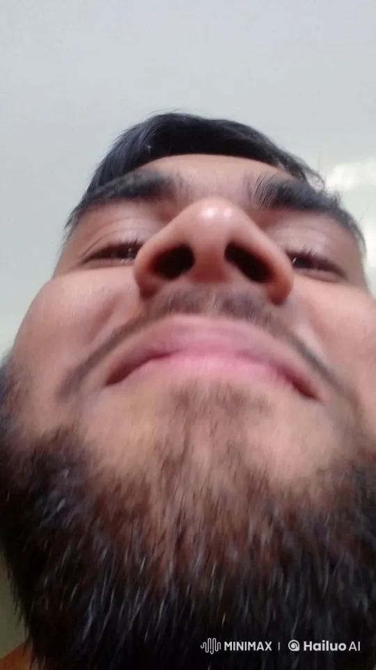 Young Man Taking a Selfie with Consistent Lighting – AI Generated Video | Hailuo AI