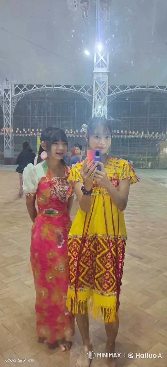 Traditional Kung Fu Demo by Two Women in Vibrant Attire – AI Generated Video | Hailuo AI