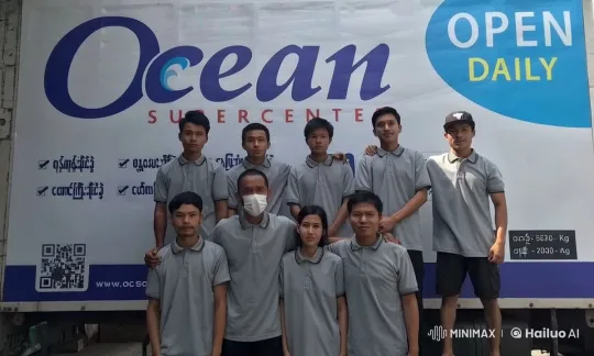 Grey Team Performs Synchronized Kung Fu in Front of Ocean Supercenter Advertisement – AI Generated Video | Hailuo AI